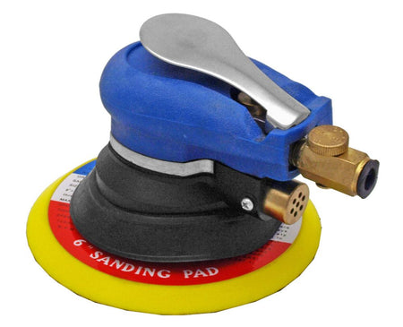 Sander with yellow sanding pad on a white background