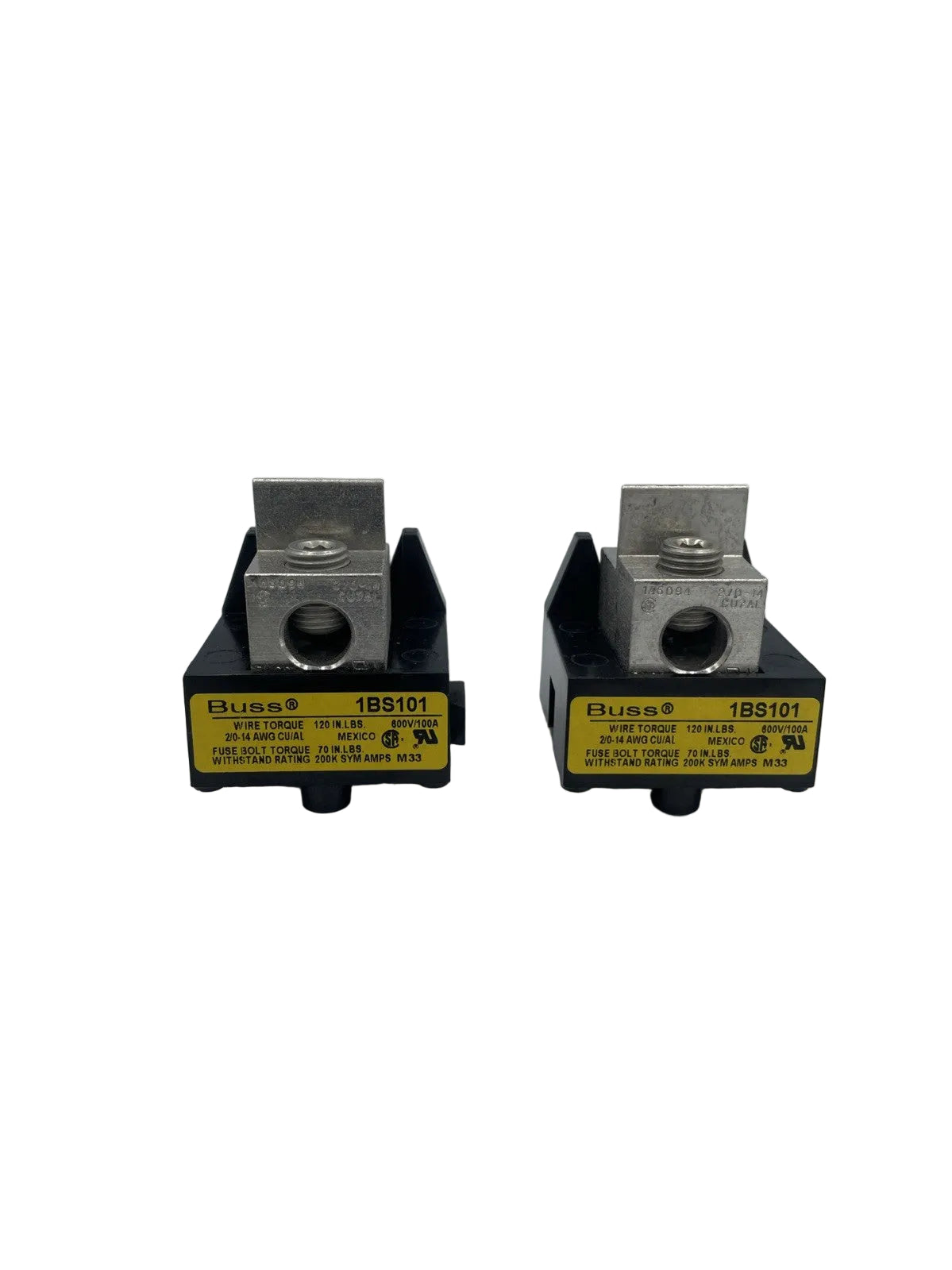 Two small black electrical terminal blocks with silver metal connectors and yellow labels reading Emsa 1BS101, photographed on a light gray background.