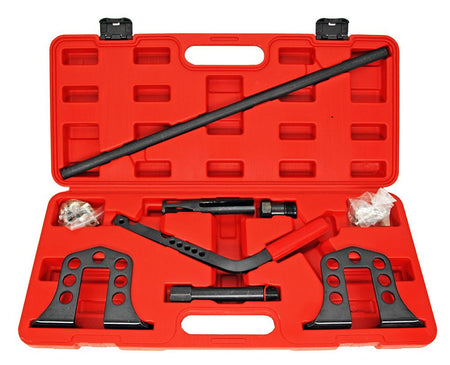 Red tool case with black automotive tools on a white background