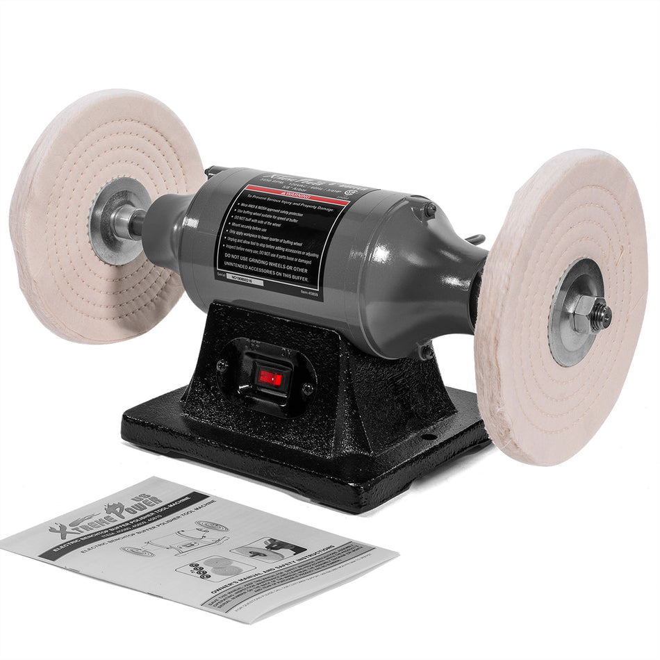 A gray and black bench grinder with two light beige abrasive wheels mounted on the sides, shown on a white background with a printed instruction booklet in front.