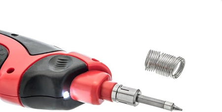 Red and black screwdriver with interchangeable bit on a white background