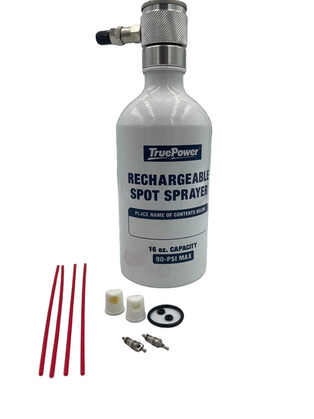 A white TruePower rechargeable spot sprayer bottle with a silver pump top, shown on a light gray background with four red applicator sticks, two white caps, and two metal nozzles placed in front.