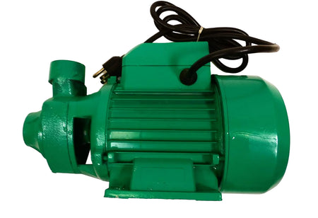 Green pump with power cord on a white background