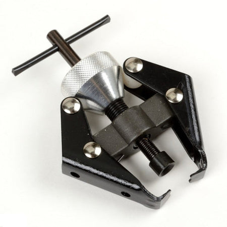 Black and silver metal tool on a white background