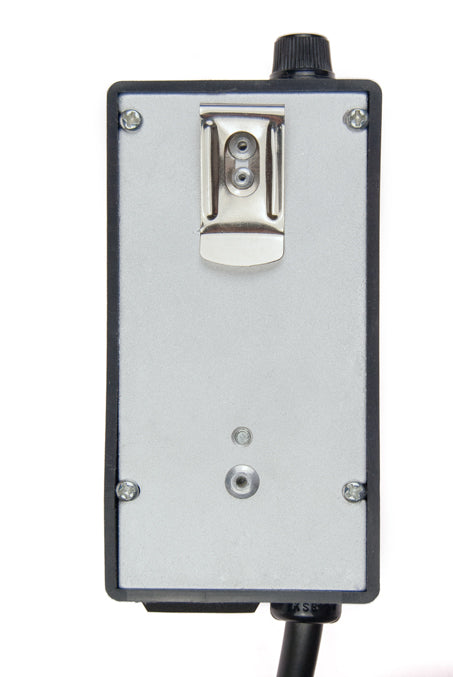 Metallic device with a cylindrical component on a white background