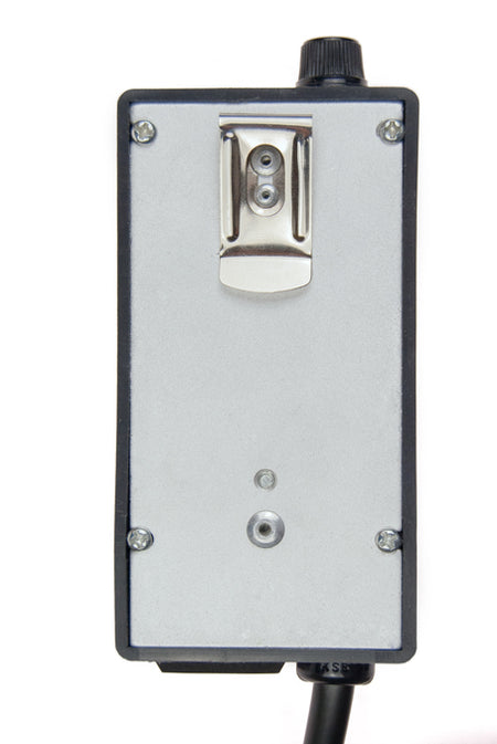 Metallic device with a cylindrical component on a white background