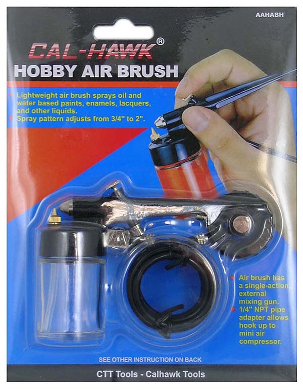 Cal-Hawk Hobby Air Brush in retail blister packaging, showing the spray gun, clear fuel tank, black hose, and printed product information on a blue, red, and black card.