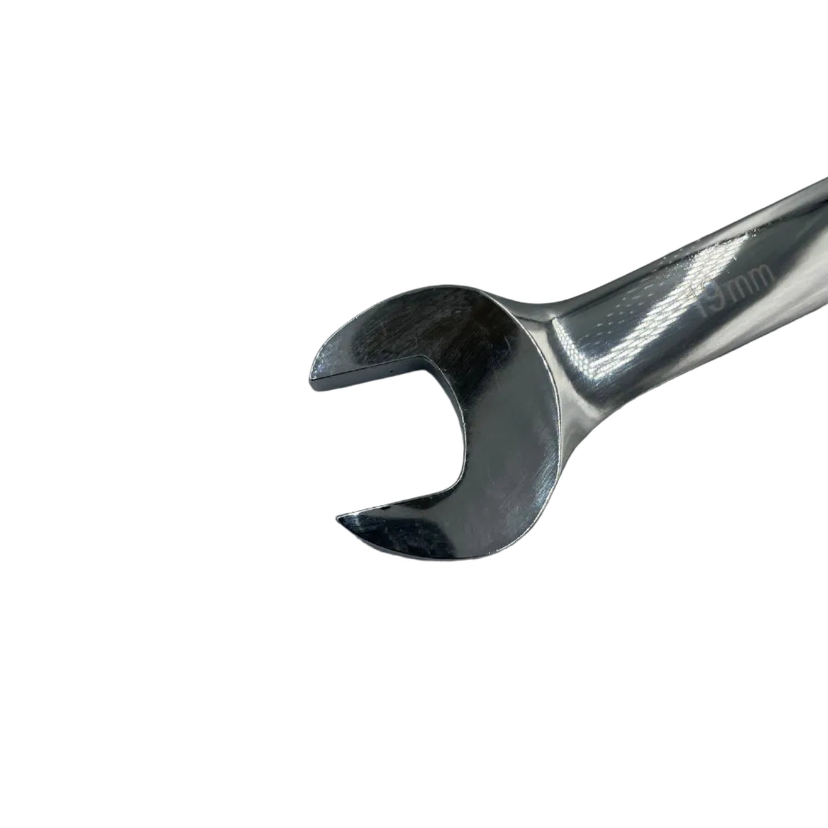 Metal wrench on a gray background
