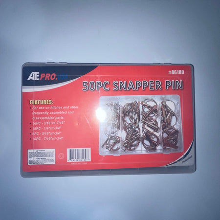 Box of 50pc snapper pins with red and black design on a gray background