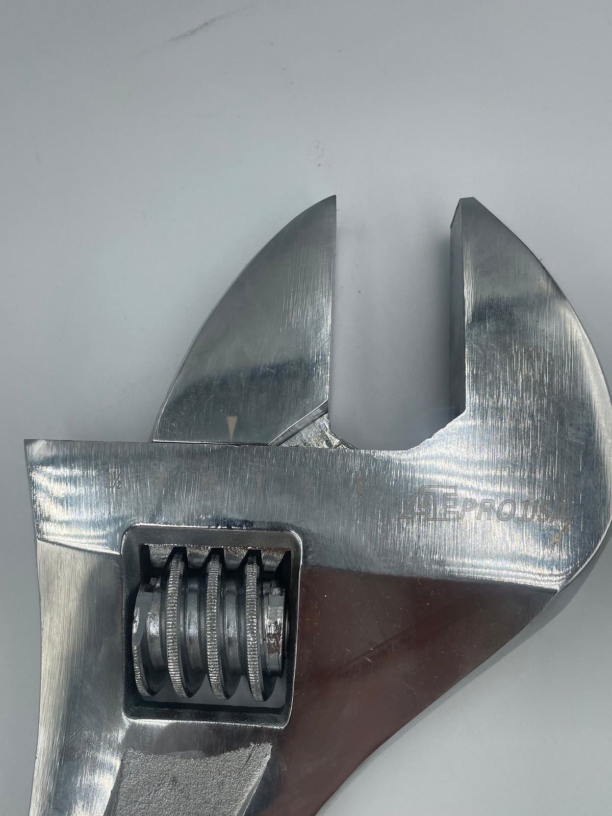 Close-up of a adjustable wrench on a white background