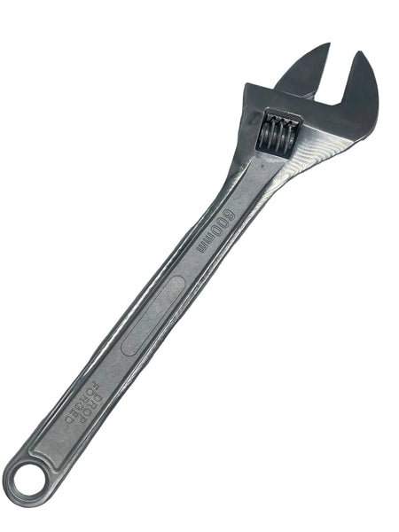 Metal adjustable wrench on a gray background