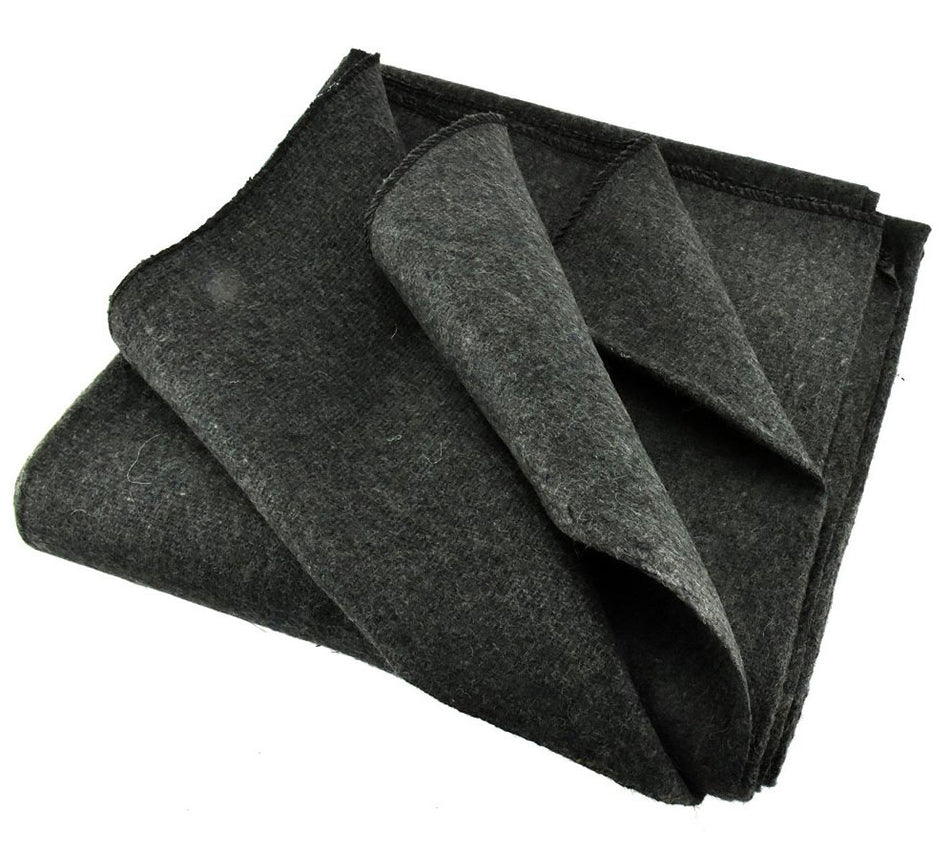Folded dark gray felt sheet on a white background