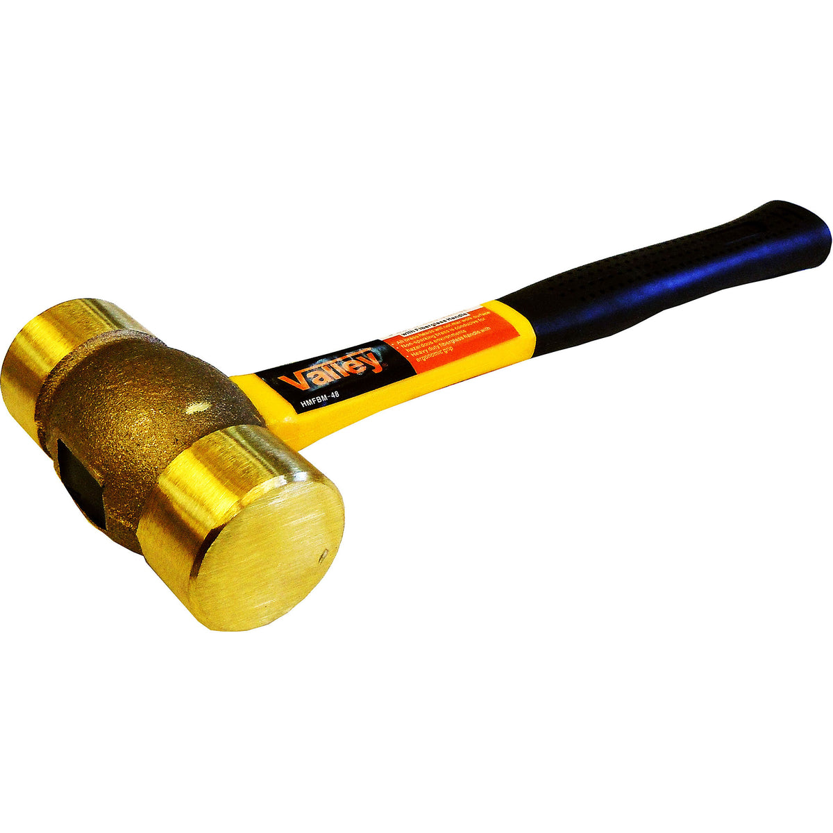 A brass mallet hammer with a polished gold-colored head and a black and yellow handle, shown on a plain white background.