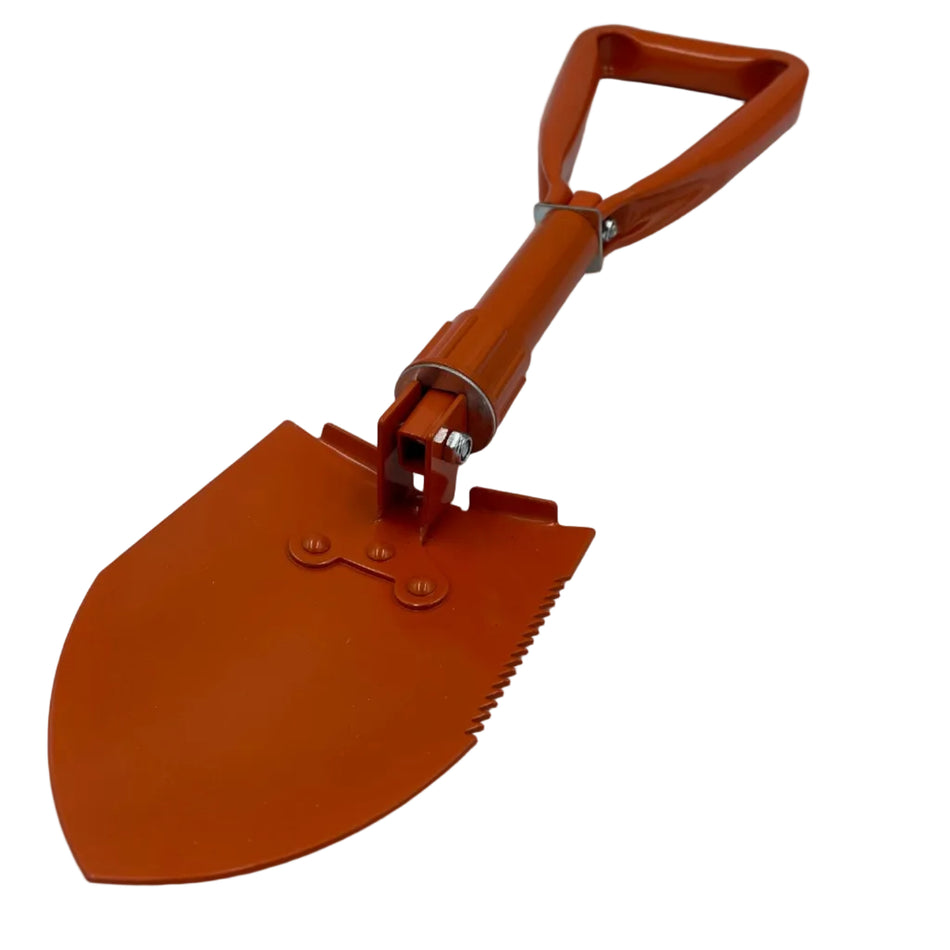 Orange folding shovel on a white background