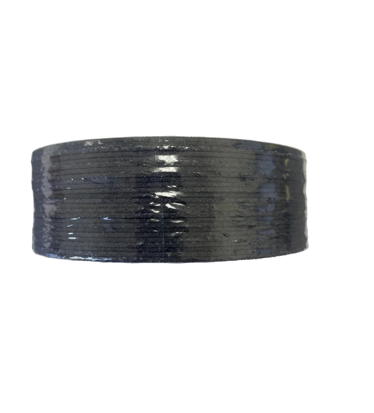 A roll of black duct tape wrapped in clear plastic, resting on a plain white surface.