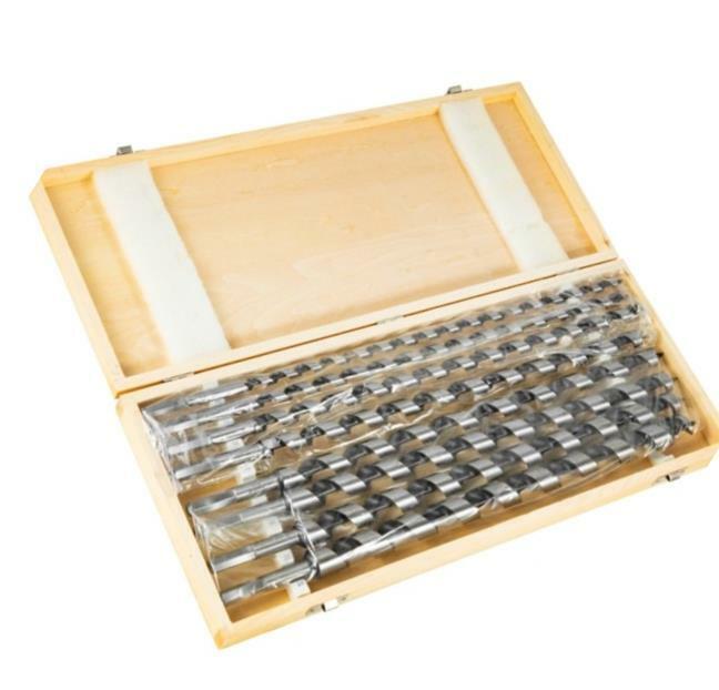A set of metal drill bits organized inside a light natural wood presentation box, photographed on a plain white background.