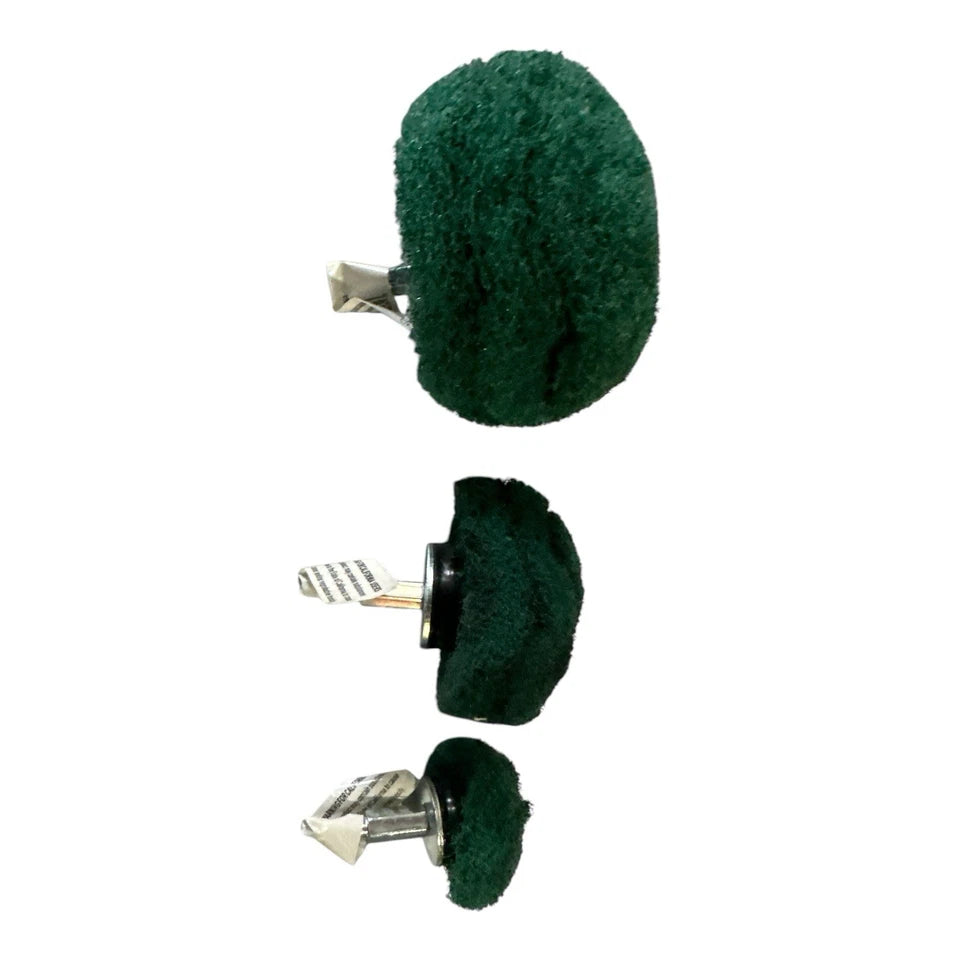 Three green brush attachments on a white background