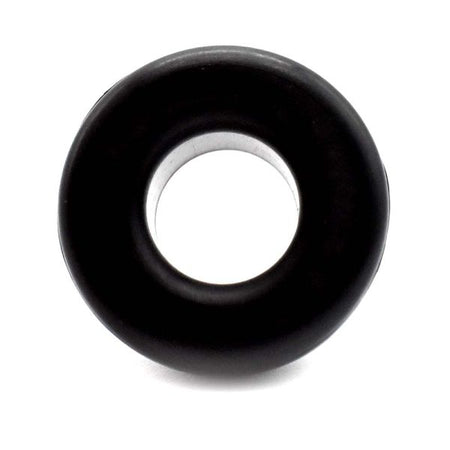 Black rubber bushing on a white background